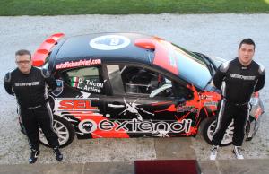 Luca Artino (a dx) e Tricoli (a sx),con la Peugeot 207 nella livrea creata per il Monza Rally Show